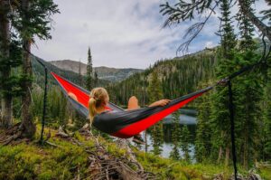 lady in hammock in mountains